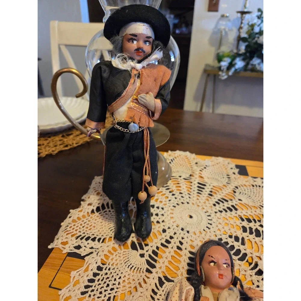 vintage Argentine gaucho folk art doll featuring a hand-painted face